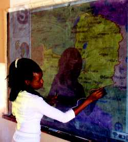 Tracing the Zambian map projected onto the blackboard